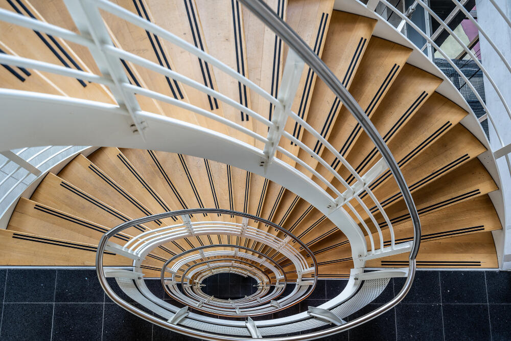 beautiful-shot-of-the-stairs-with-spiral-staircase.jpg