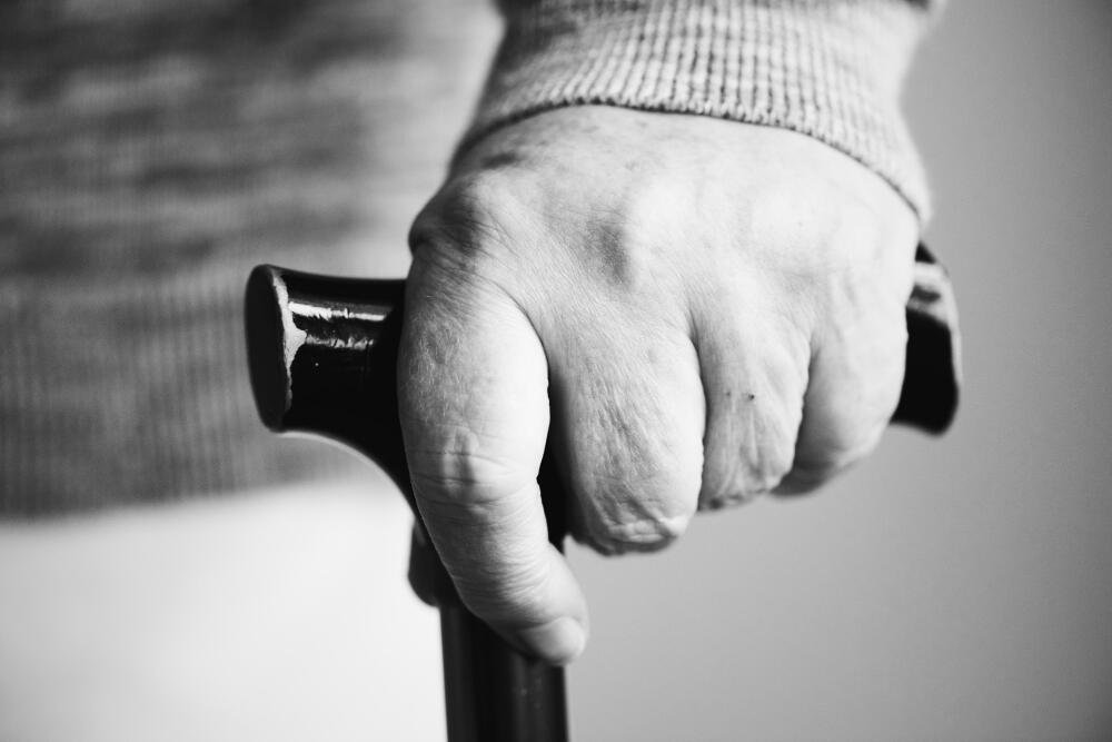 closeup-of-elderly-hand-holding-walking-stick.jpg